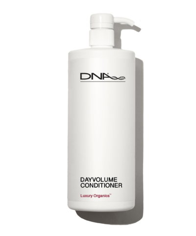 DNA Organics Day Volume Conditioner bottle, designed to add volume and fullness to hair with organic ingredients, leaving it soft, bouncy, and nourished throughout the day